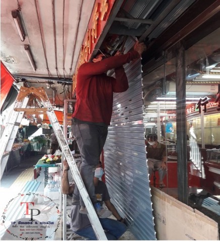 ช่างซ่อมประตูม้วนงานคุณภาพ